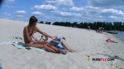 Young nudist with big boobs loves spending time at the beach - hclips.com